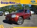 2007 Red Rock Crystal Pearl Jeep Grand Cherokee Laredo 4x4  photo #1