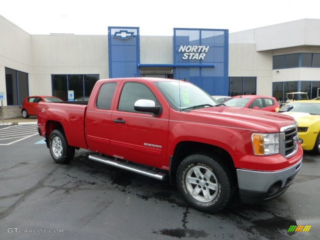 2010 Sierra 1500 SLE Extended Cab 4x4 - Fire Red / Ebony photo #1