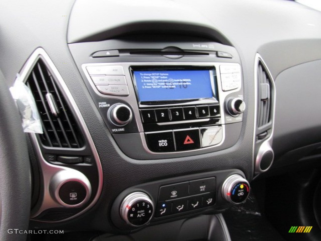 2013 Hyundai Tucson GL Controls Photo #71428742