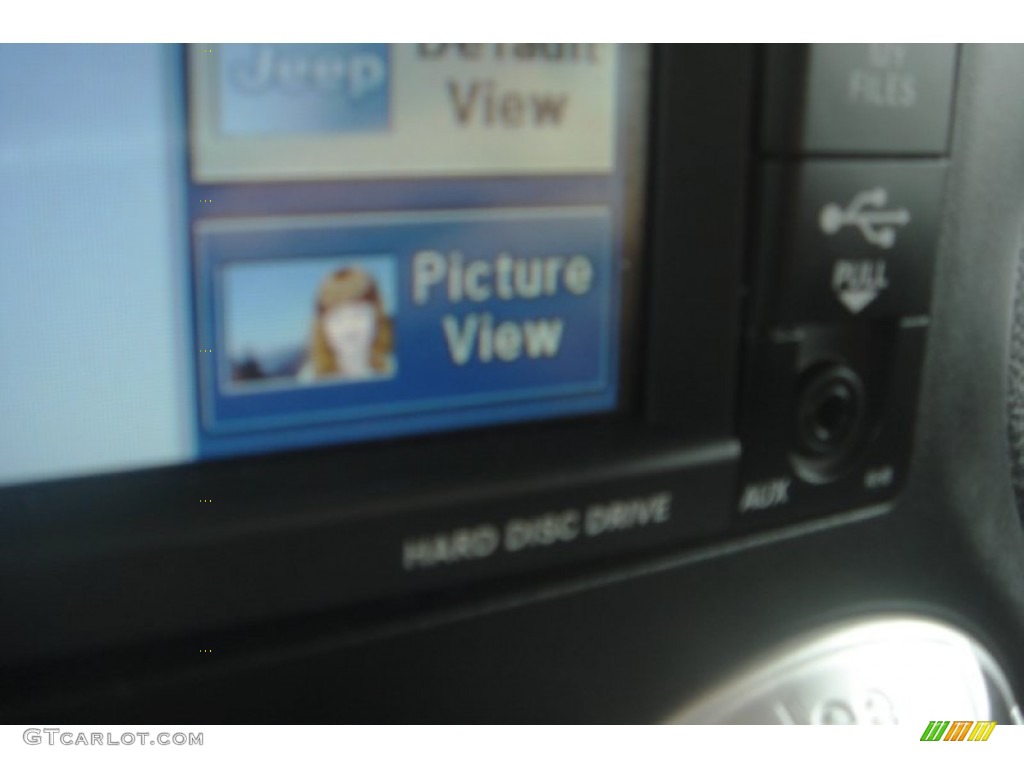 2011 Wrangler Sahara 4x4 - Mango Tango Pearl / Black photo #32