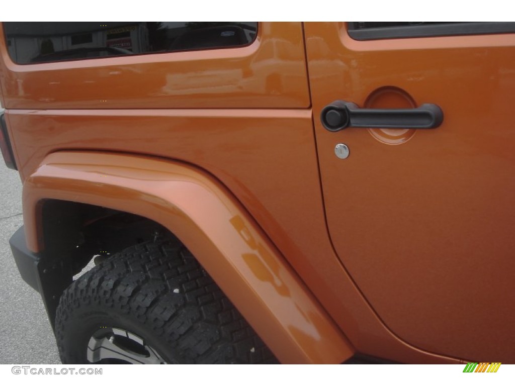 2011 Wrangler Sahara 4x4 - Mango Tango Pearl / Black photo #47