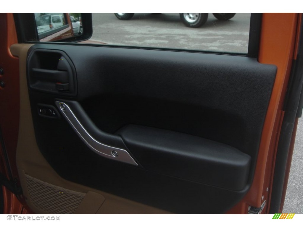 2011 Wrangler Sahara 4x4 - Mango Tango Pearl / Black photo #51