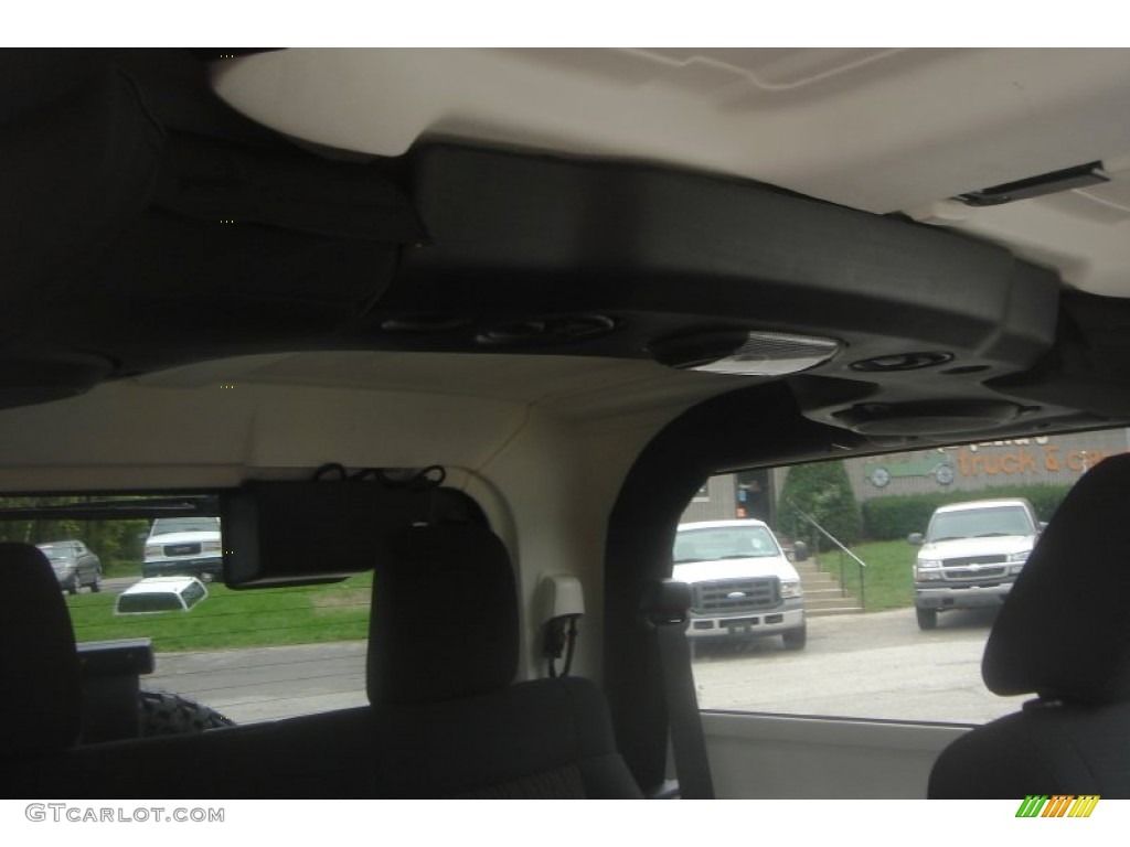 2011 Wrangler Sahara 4x4 - Mango Tango Pearl / Black photo #59