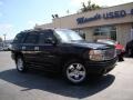 2005 Onyx Black GMC Yukon Denali AWD  photo #28