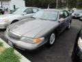 1996 Desert Violet Metallic Lincoln Continental   photo #1