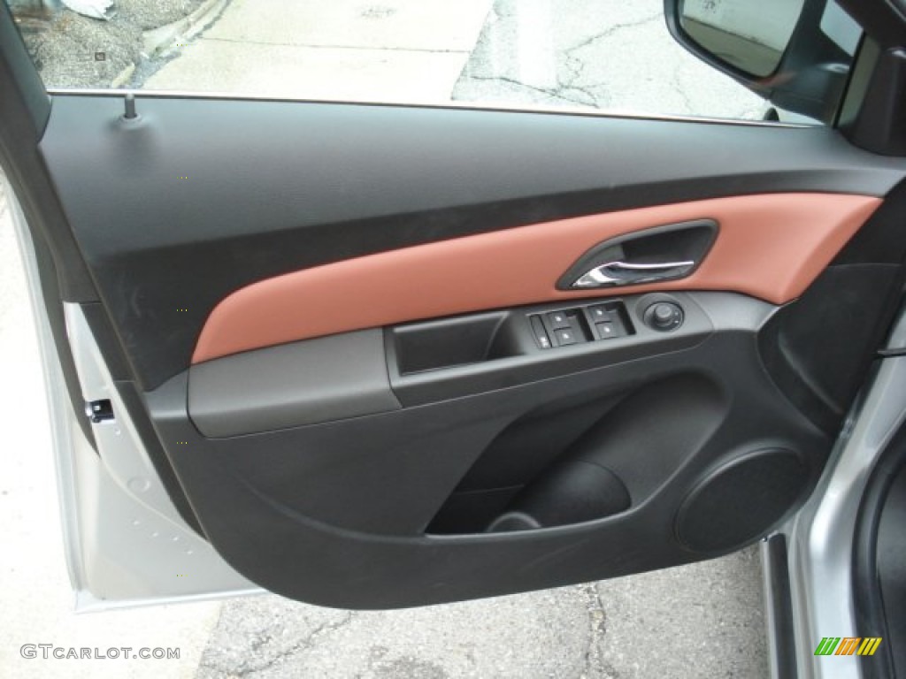 2012 Chevrolet Cruze LT Jet Black/Brick Door Panel Photo #71555161