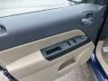 2013 Jeep Patriot Dark Slate Gray/Light Pebble Interior Door Panel Photo