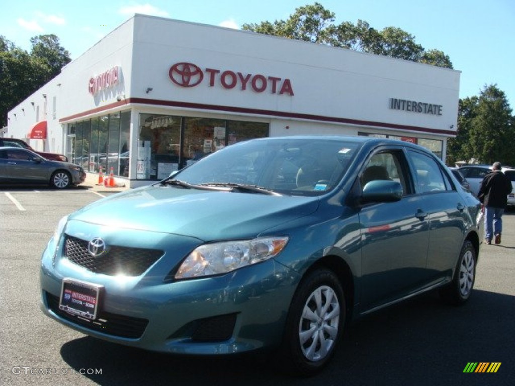 Capri Sea Green Metallic Toyota Corolla