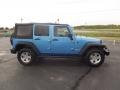 2010 Surf Blue Pearl Jeep Wrangler Unlimited Rubicon 4x4  photo #4