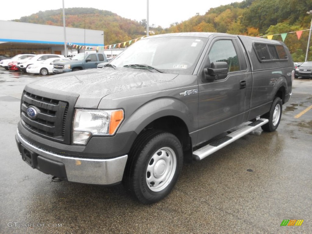 2010 F150 XL Regular Cab 4x4 - Sterling Grey Metallic / Medium Stone photo #1