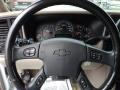 2003 Chevrolet Suburban Tan/Neutral Interior Steering Wheel Photo