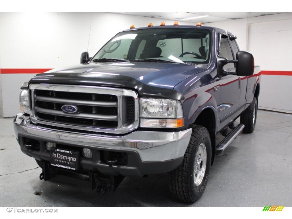 2004 F350 Super Duty XLT SuperCab 4x4 - Medium Wedgewood Blue Metallic / Medium Flint photo #7