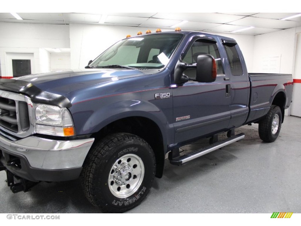 2004 F350 Super Duty XLT SuperCab 4x4 - Medium Wedgewood Blue Metallic / Medium Flint photo #9