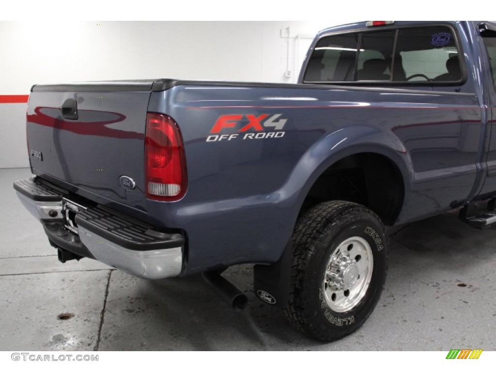 2004 F350 Super Duty XLT SuperCab 4x4 - Medium Wedgewood Blue Metallic / Medium Flint photo #19