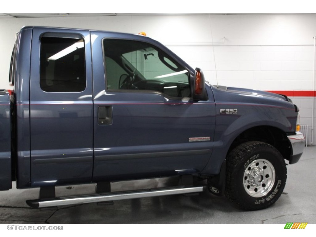 2004 F350 Super Duty XLT SuperCab 4x4 - Medium Wedgewood Blue Metallic / Medium Flint photo #21