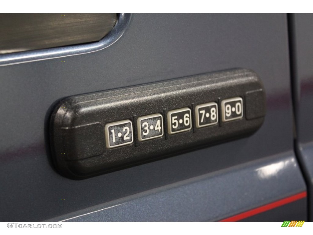 2004 F350 Super Duty XLT SuperCab 4x4 - Medium Wedgewood Blue Metallic / Medium Flint photo #38