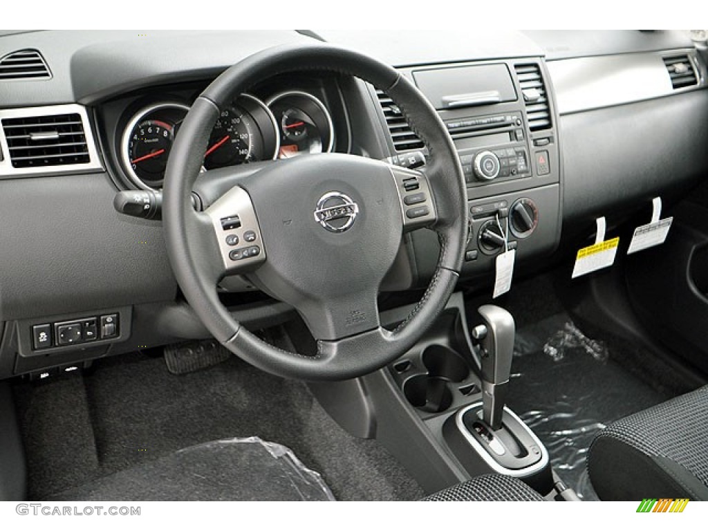 Charcoal Interior 2012 Nissan Versa 1.8 SL Hatchback Photo #71634820