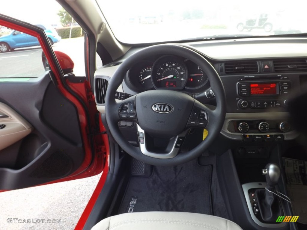 2013 Kia Rio EX Sedan Beige Steering Wheel Photo #71643196