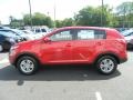 2011 Signal Red Kia Sportage   photo #2