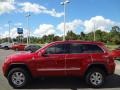 2011 Inferno Red Crystal Pearl Jeep Grand Cherokee Laredo 4x4  photo #2