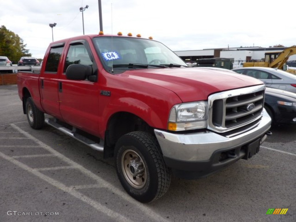 2004 F250 Super Duty XLT Crew Cab 4x4 - Red / Medium Flint photo #1