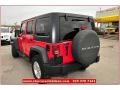 2011 Flame Red Jeep Wrangler Unlimited Rubicon 4x4  photo #4