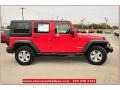 2011 Flame Red Jeep Wrangler Unlimited Rubicon 4x4  photo #7