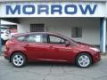 2013 Ruby Red Ford Focus SE Hatchback  photo #1