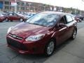 2013 Ruby Red Ford Focus SE Hatchback  photo #4