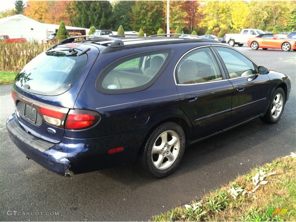 2002 Taurus SE - Medium Royal Blue Metallic / Medium Graphite photo #5