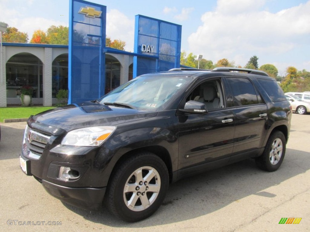 2009 Outlook XE AWD - Carbon Flash Black / Black photo #1