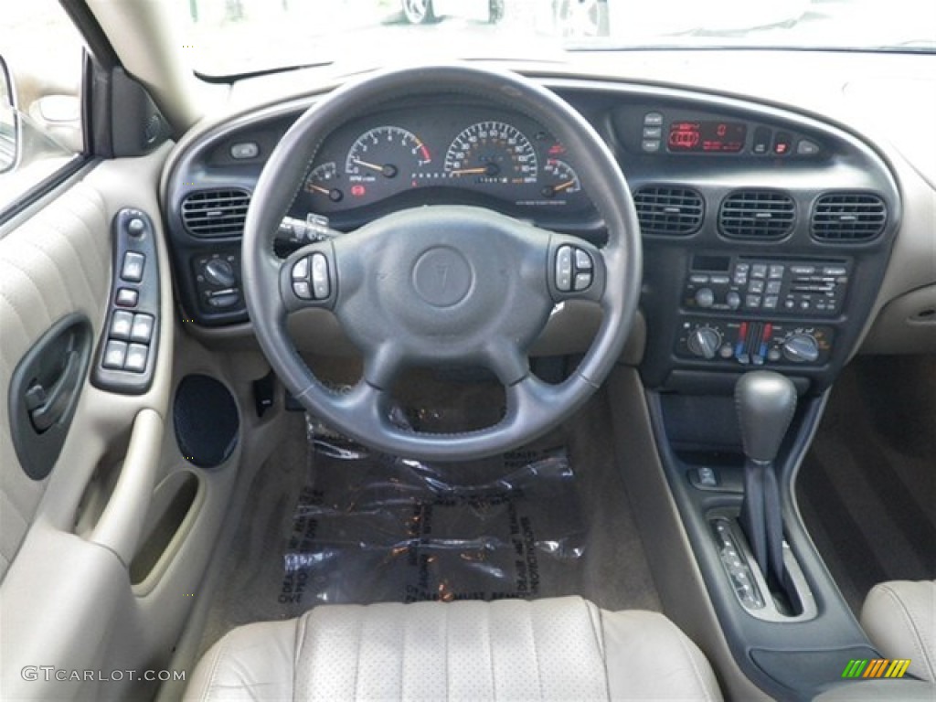2003 Grand Prix GTP Sedan - Champagne Beige Metallic / Dark Taupe photo #32