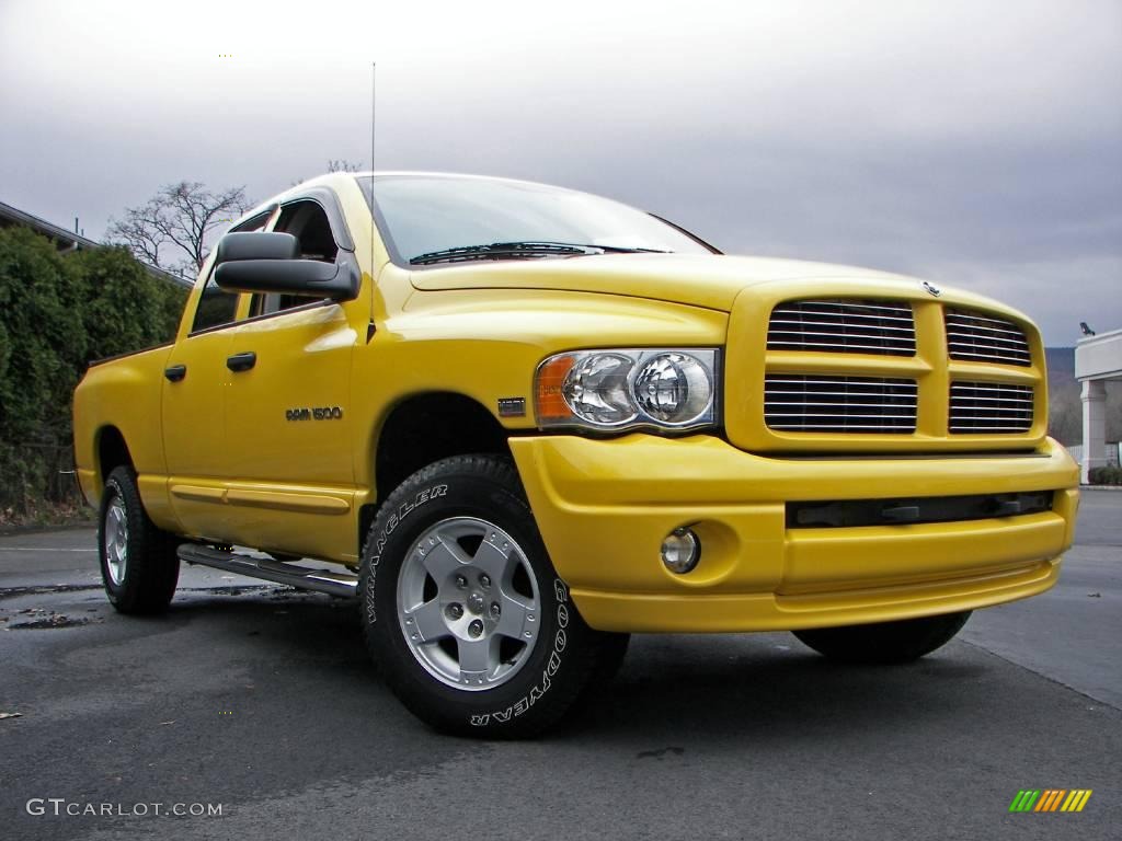 2005 Ram 1500 SLT Quad Cab 4x4 - Solar Yellow / Dark Slate Gray photo #28