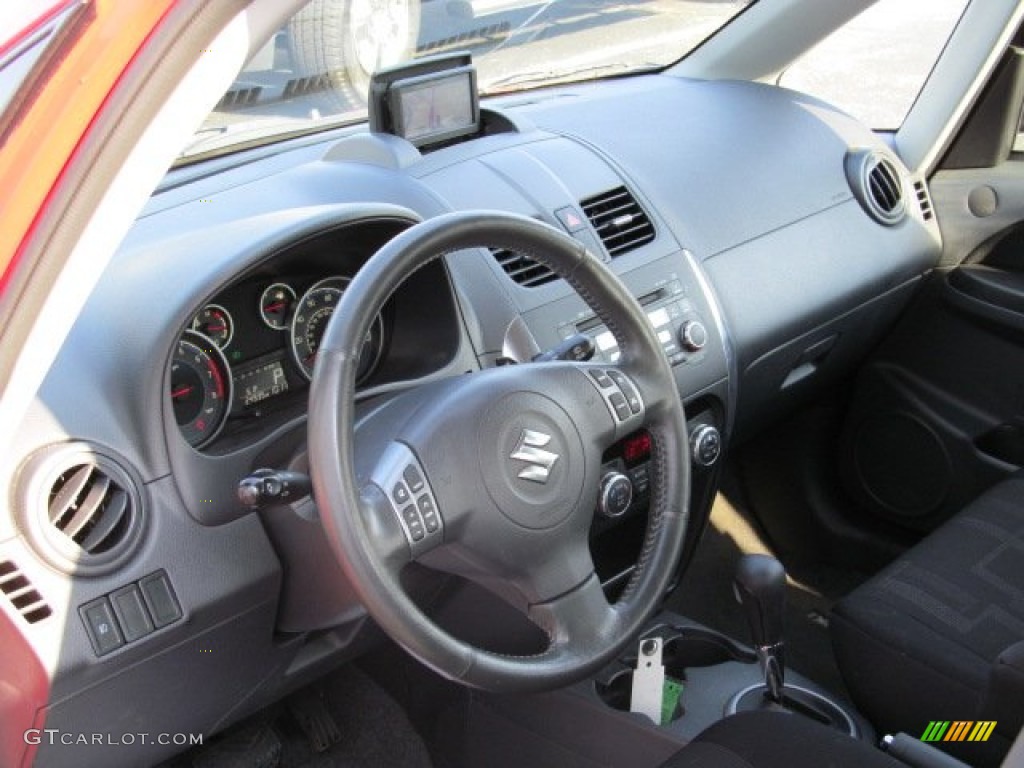 2010 Suzuki SX4 Crossover Technology AWD Black Dashboard Photo #71786091