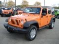 Front 3/4 View of 2013 Wrangler Unlimited Sport 4x4
