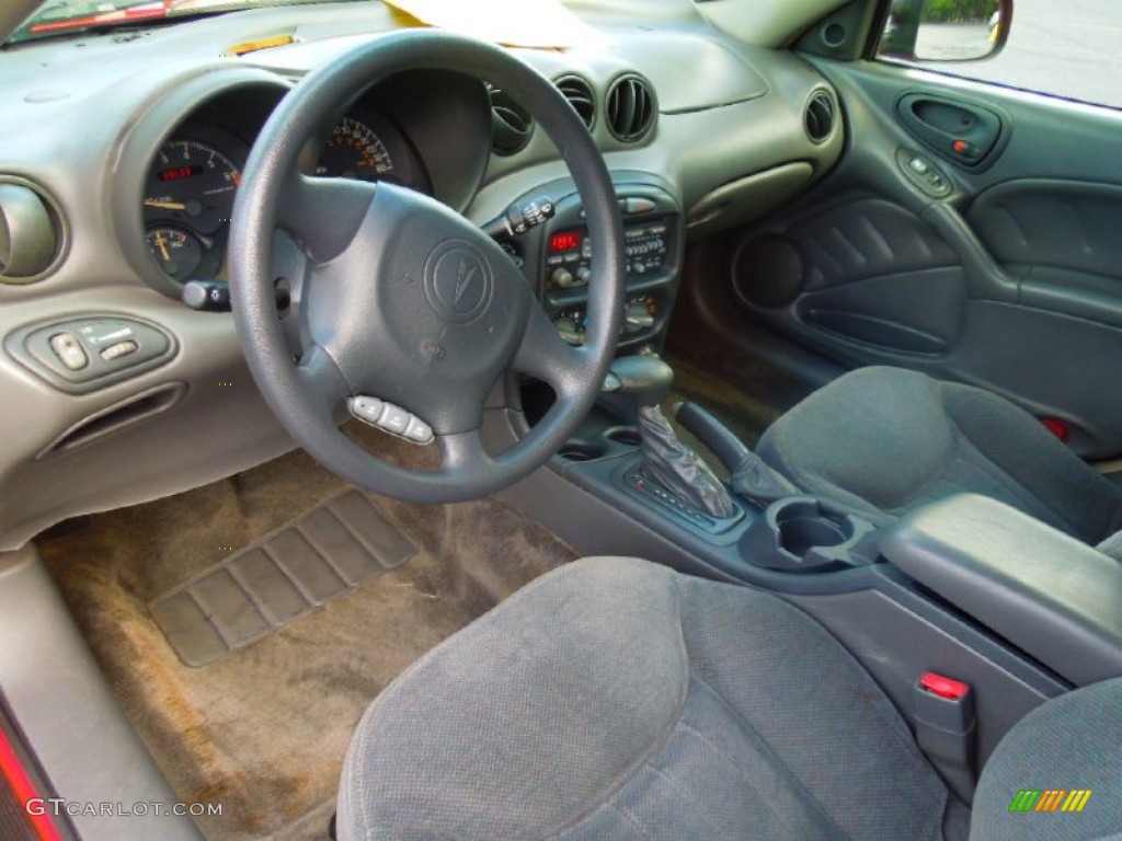 2000 Grand Am SE Sedan - Bright Red / Dark Taupe photo #25