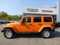 2013 Crush Orange Jeep Wrangler Unlimited Sahara 4x4  photo #2