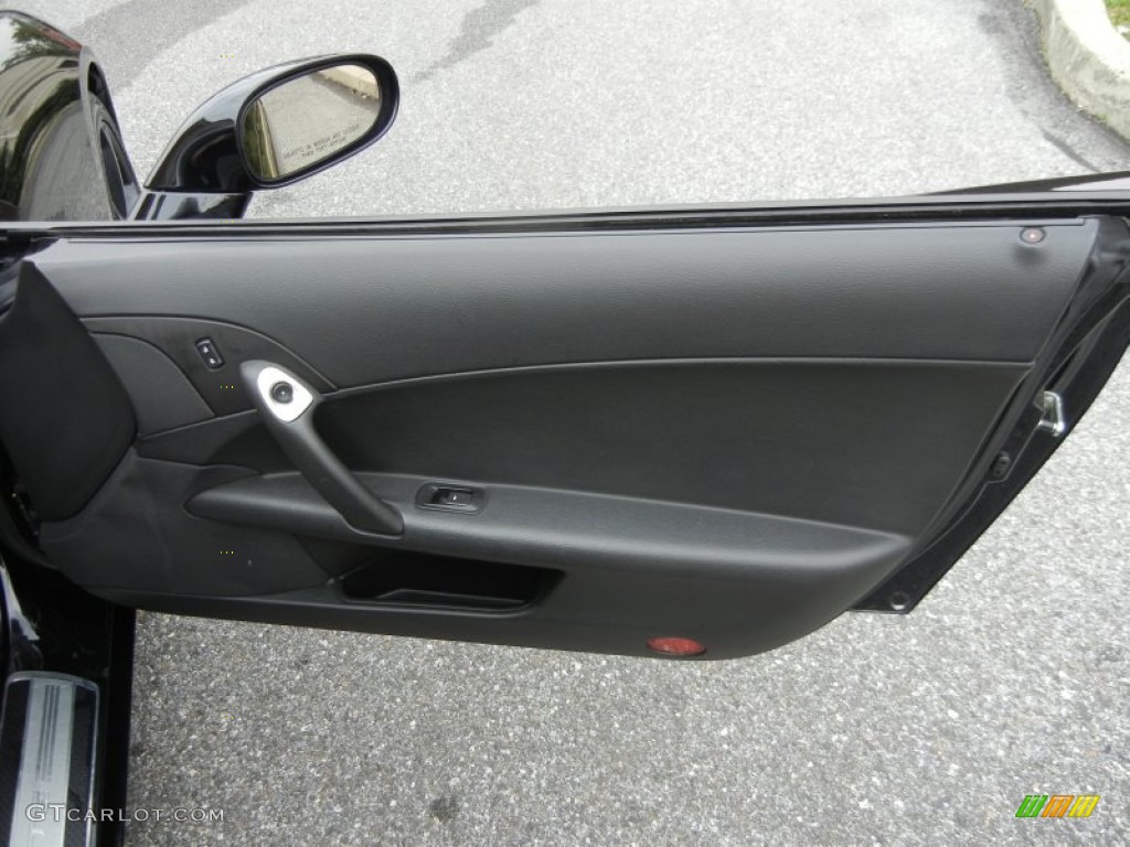 2009 Chevrolet Corvette Coupe Ebony Door Panel Photo #71848400