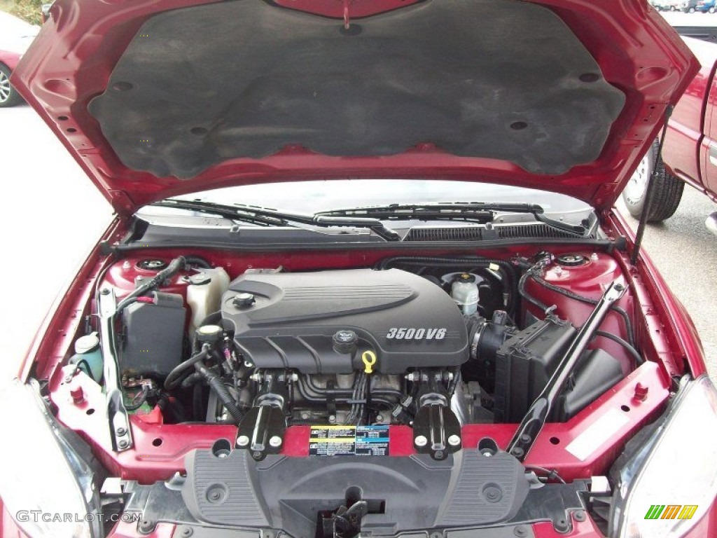 2006 Impala LS - Sport Red Metallic / Ebony Black photo #16