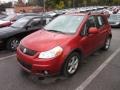 2009 Cherry Red Metallic Suzuki SX4 Crossover Touring AWD  photo #3