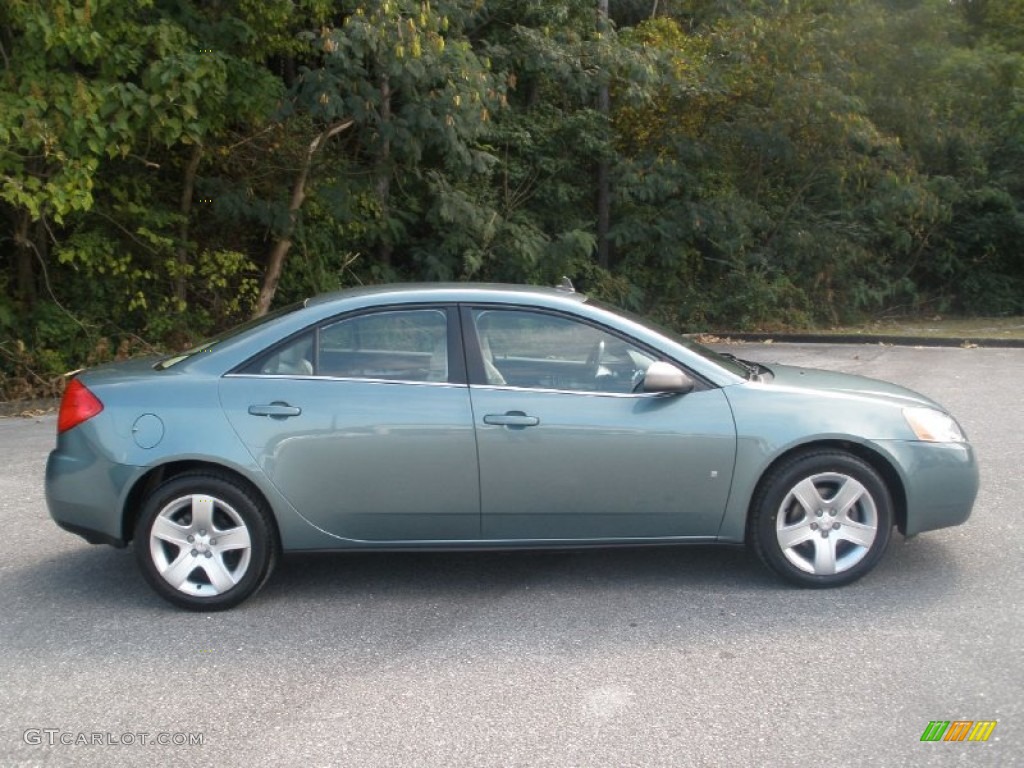 Blue Gold Crystal Metallic 2009 Pontiac G6 Sedan Exterior Photo #72019513