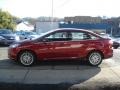 2013 Ruby Red Ford Focus Titanium Sedan  photo #5