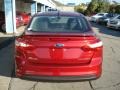 2013 Ruby Red Ford Focus Titanium Sedan  photo #7