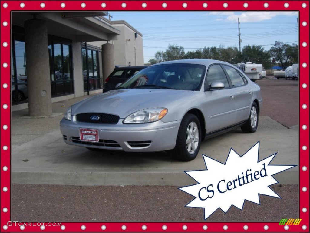 Silver Frost Metallic Ford Taurus