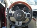 2013 Jeep Grand Cherokee Dark Frost Beige/Light Frost Beige Interior Steering Wheel Photo