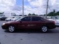 2004 Merlot Metallic Ford Taurus SES Sedan  photo #8