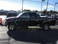 2002 Black Ford F150 XLT SuperCab 4x4  photo #4