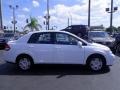 2011 Fresh Powder White Nissan Versa 1.8 S Sedan  photo #19