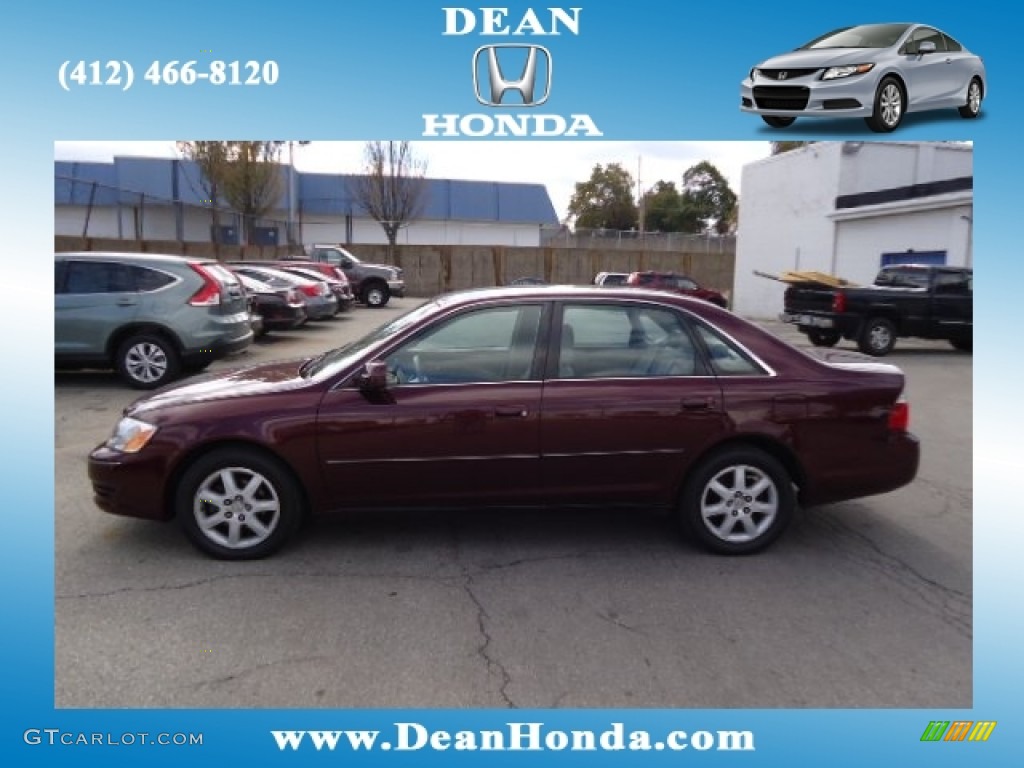 2004 Avalon XL - Cassis Red Pearl / Stone photo #1