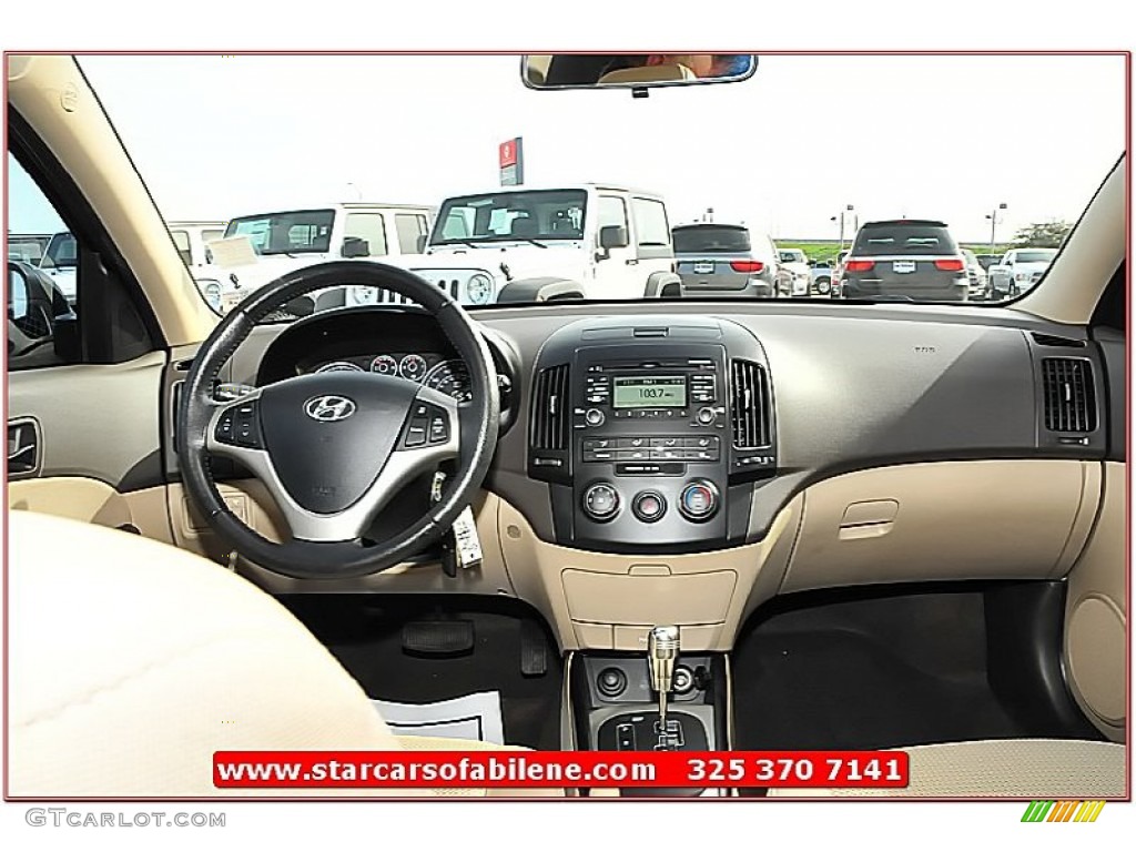 2009 Elantra Touring - Black Pearl / Beige photo #25